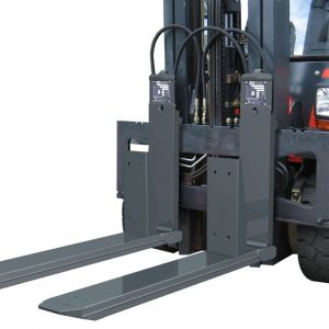 A close-up of a forklift's forks and lifting mechanism.