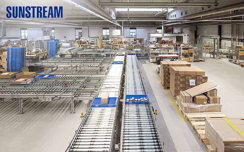 Automated warehouse facility optimized for high-volume packaging throughput